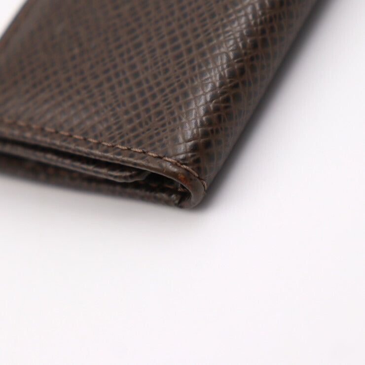 Beautiful Louis Vuitton Multicle 4 Key Case M30528 Taiga Grisli Silver Hardware 4-Row Vuitton