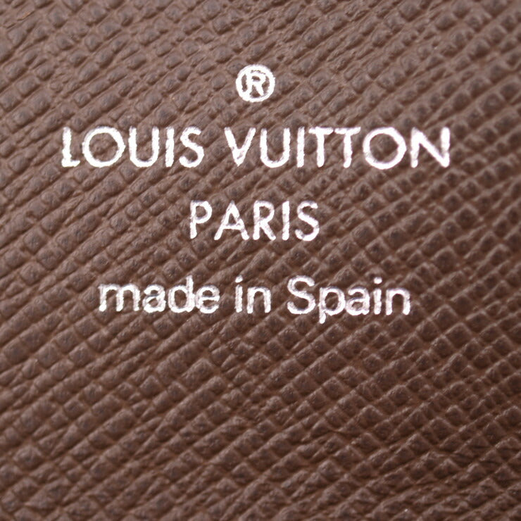 Beautiful Louis Vuitton Multicle 4 Key Case M30528 Taiga Grisli Silver Hardware 4-Row Vuitton