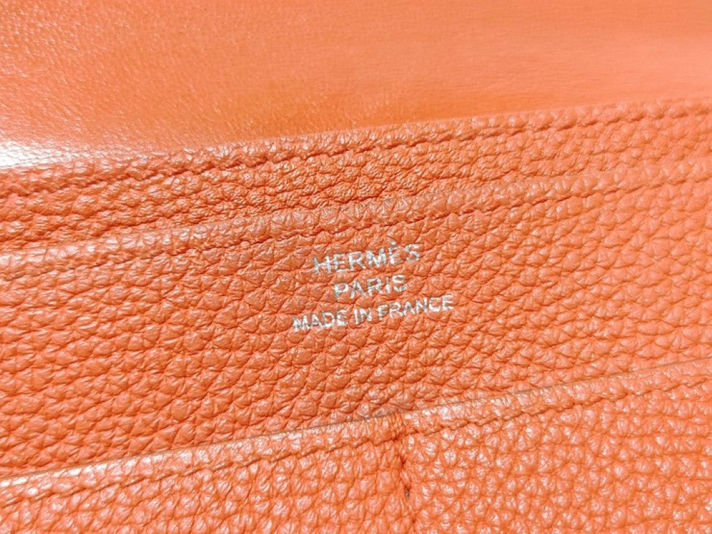 HERMES エルメス 長財布 ドゴンGM X刻印 オレンジ系 トリヨンクレマンス レディース 二つ折り シルバー金具