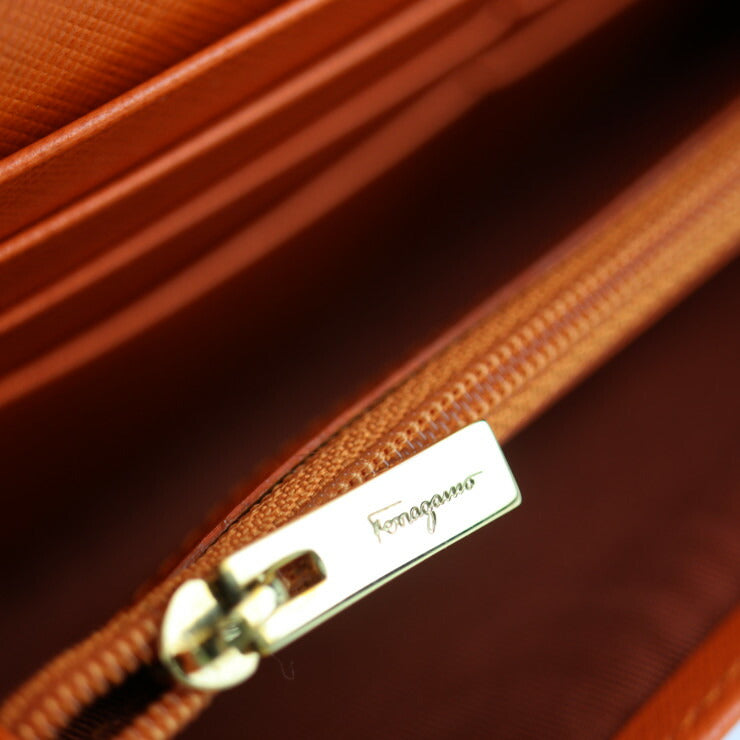 美品 Salvatore Ferragamo サルヴァトーレ フェラガモ ヴァラ 長財布 22 A994 レザー オレンジ ゴールド金具 リボン フラップ