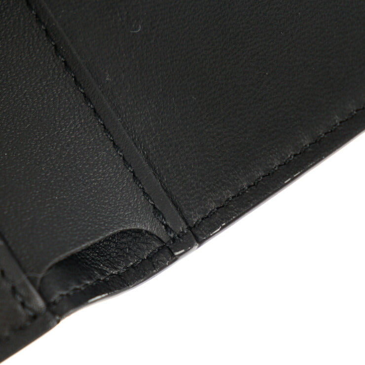 新古未使用展示品 LOUIS VUITTON ルイ ヴィトン ポルトフォイユ カプシーヌ LV × YK 草間彌生 コラボ 三つ折り財布 M81963 トリヨンレザー ブラック マルチカラー シルバー金具 2023年コレクション ビトン