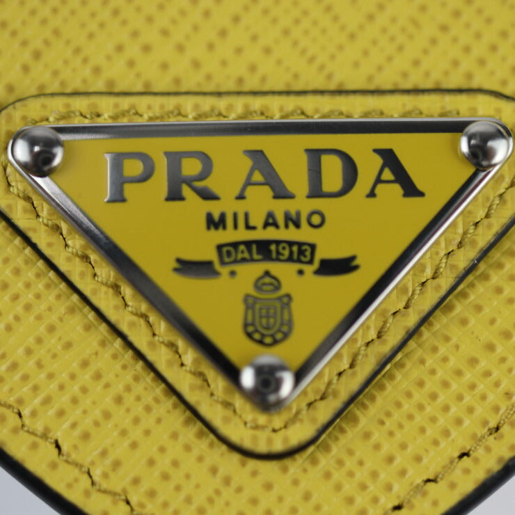 新品未使用展示品 PRADA プラダ 小銭入れ コインケース 2MM004 サフィアーノレザー SOLE イエロー系 三角ロゴ
