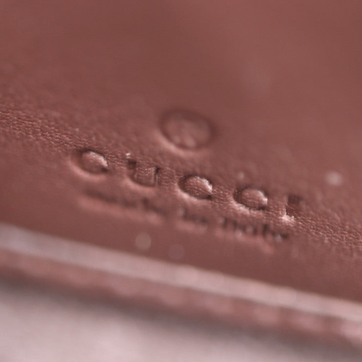 GUCCI GG Marmont Long Wallet 456117 in good condition, made of python, brown and yellow, gold hardware, round zipper, and exotic leather