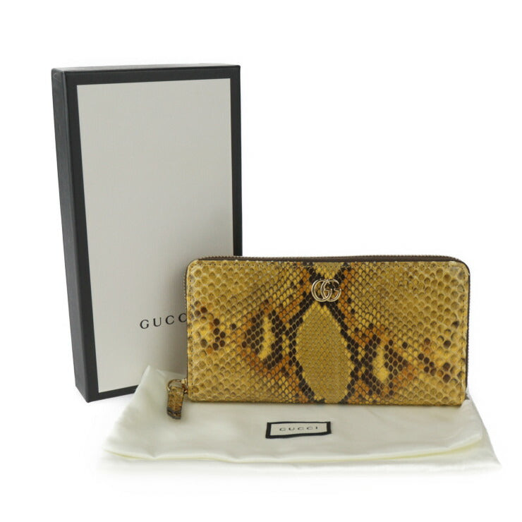 GUCCI GG Marmont Long Wallet 456117 in good condition, made of python, brown and yellow, gold hardware, round zipper, and exotic leather