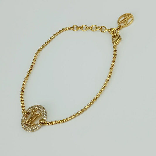 美品 LOUIS VUITTON ルイヴィトン ブレスレット ブレスレット･ルイーズ バイ ナイト M00758 ゴールド メタル ラインストーン レディース サークルロゴ