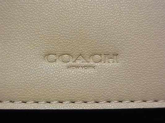 COACH コーチ 二つ折り財布 キスロック ミディアム ウォレット C8724 ベージュ系 シグネチャーキャンバス レザー レディース がま口 ゴールド金具 新古未使用展示品