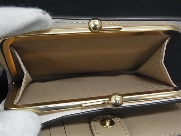 COACH コーチ 二つ折り財布 キスロック ミディアム ウォレット C8724 ベージュ系 シグネチャーキャンバス レザー レディース がま口 ゴールド金具 新古未使用展示品