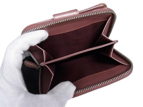 PRADA プラダ 財布 サフィアーノ 1M0605 ピンクメタリック レザー レディース 二つ折り 長財布 シルバー金具 美品