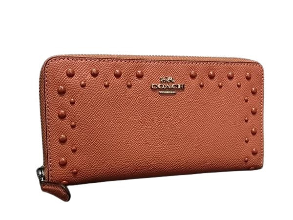 COACH コーチ 長財布 ボーダー スタッズ アコーディオン ジップ アラウンド F55610 コーラルピンク系 レザー レディース スタッズ シルバー金具 新古未使用展示品