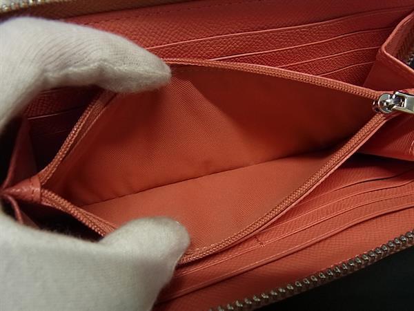 COACH コーチ 長財布 ボーダー スタッズ アコーディオン ジップ アラウンド F55610 コーラルピンク系 レザー レディース スタッズ シルバー金具 新古未使用展示品