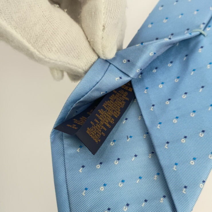 新品未使用展示品 LOUIS VUITTON ルイ ヴィトン ネクタイ クラヴァット LV スペリング M77848 ライトブルー シルク100％ メンズ