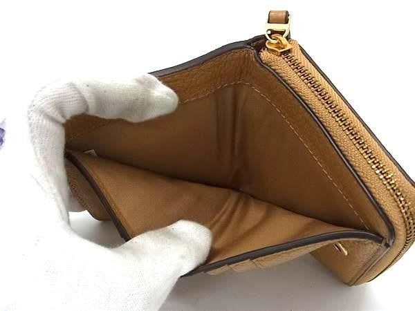 TORY BURCH トリーバーチ 二つ折り財布 ブリテン ブラウン系 レザー レディース ラウンドファスナー ゴールド金具 美品