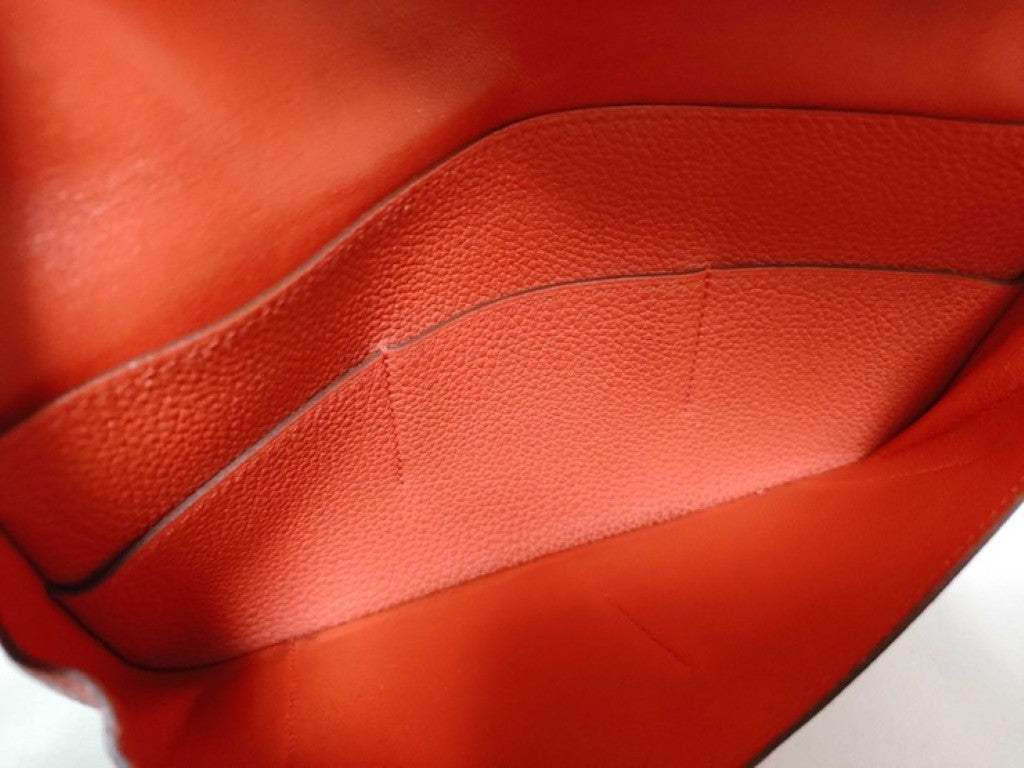 HERMES エルメス 長財布 ドゴンGM X刻印 オレンジ系 トリヨンクレマンス レディース 二つ折り シルバー金具