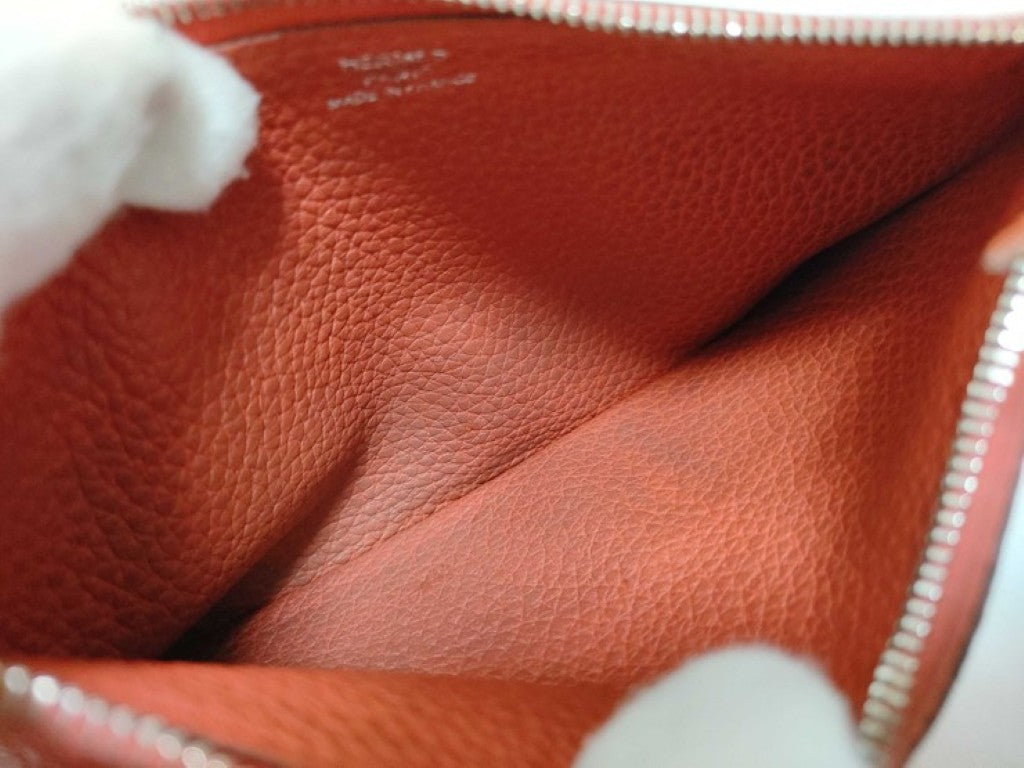 HERMES エルメス 長財布 ドゴンGM X刻印 オレンジ系 トリヨンクレマンス レディース 二つ折り シルバー金具