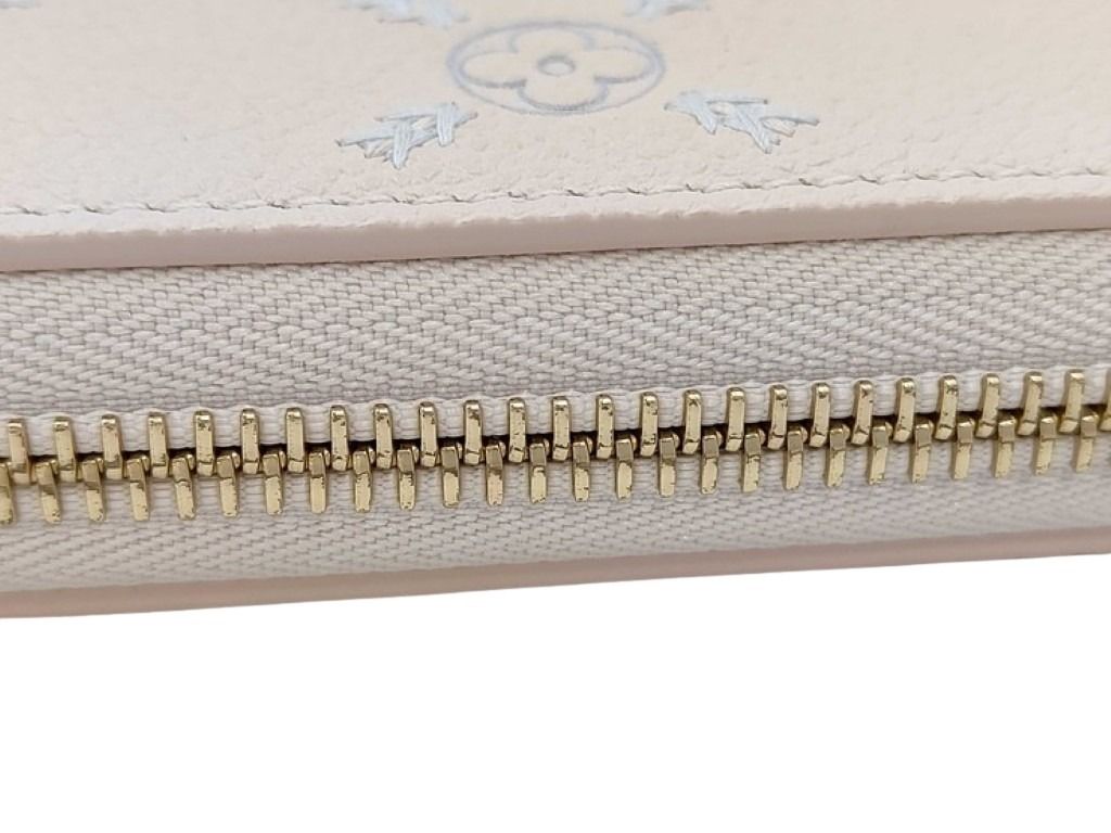 LOUIS VUITTON ルイヴィトン 長財布 ジッピーウォレット M28510 クオーツクチュール(ベージュ系） モノグラム アンプラント ユニセックス ラウンドファスナー ゴールド金具 超美品
