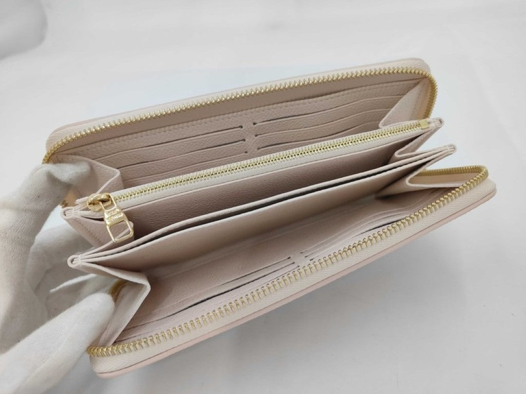 LOUIS VUITTON ルイヴィトン 長財布 ジッピーウォレット M28510 クオーツクチュール(ベージュ系） モノグラム アンプラント ユニセックス ラウンドファスナー ゴールド金具 超美品