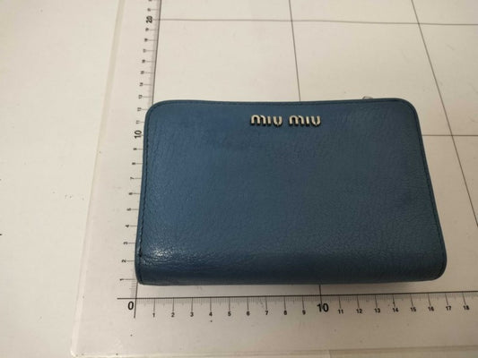 miu miu ミュウミュウ 2つ折財布 マドラス クリスタル 5M1225 ブルー系 レザー レディース スタッズ リボン L字ファスナー シルバー金具 美品
