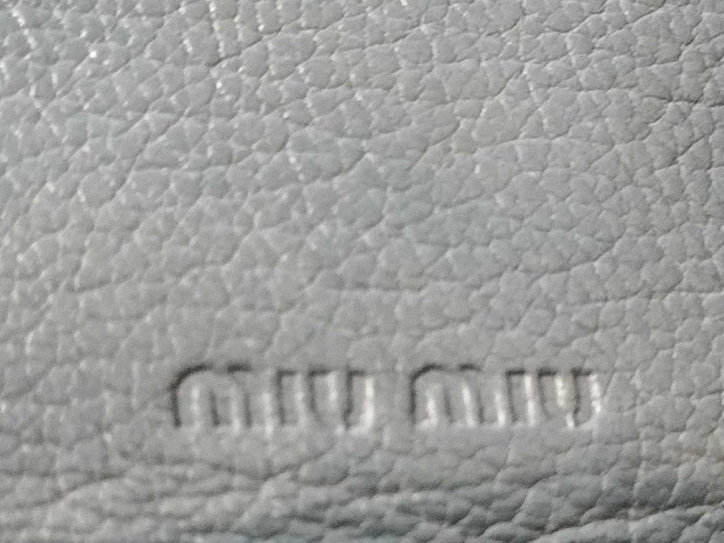 miu miu ミュウミュウ 2つ折財布 マドラス クリスタル 5M1225 ブルー系 レザー レディース スタッズ リボン L字ファスナー シルバー金具 美品