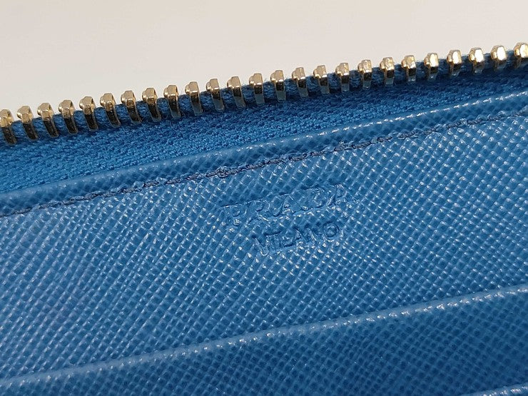 PRADA プラダ 長財布 1M0506 ブルー系 サフィアーノレザー ユニセックス ラウンドファスナー ゴールド金具 美品