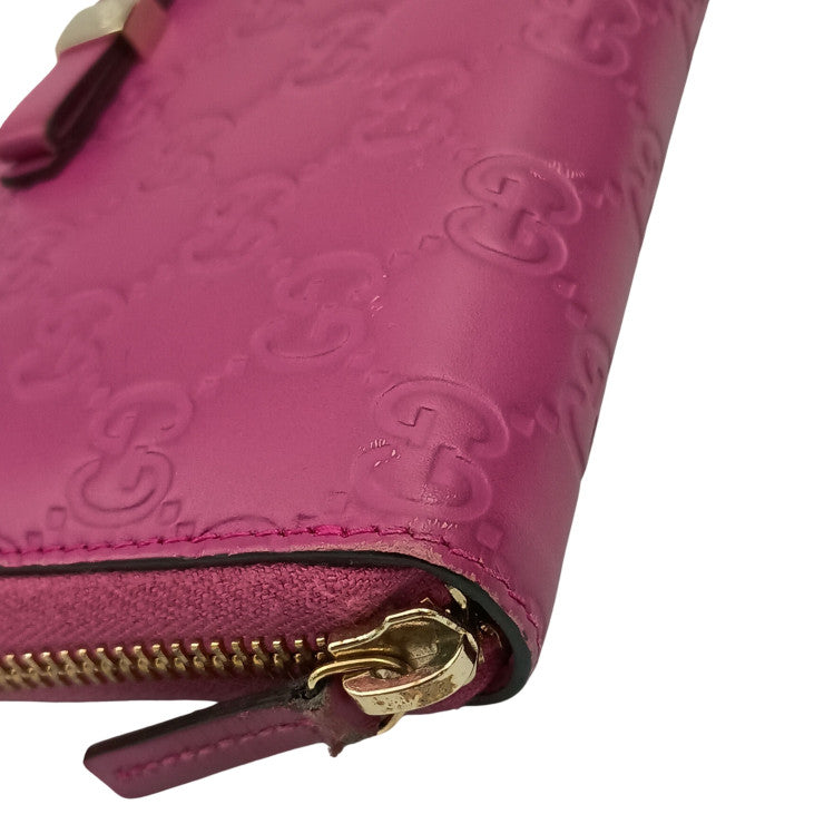 GUCCI グッチ 長財布 グッチシマ 388680 ピンク系 グッチシグネチャーレザー レディース リボン ラウンドファスナー ゴールド金具 美品